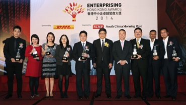 (From L) Winners Jonathan UNG of Drop-Shipping Global Services Ltd, Rendy Ng of Bee's Diamonds, Anita Lee, 4M Industrial Development Ltd, Fanny Fan of Ultra Active Technology Ltd, Stanley Wong of Chuan Chiong Co.Ltd, Robin Hu, CEO of SCMP Group, Ken Lee, Executive Vice President, Commercial, Asia Pacific, Managing Director, Hong Kong and Macau of DHL Express, Herman Lo, Fu Hong Industries Ltd, Girish Jhunjhnuwala of Ovolo Hotel and Alan Lim of E-Services Group Ltd, pose during the Enterprising Hong Kong Awards at Admiralty. 25SEP14
